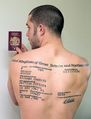 Татуировка в виде страницы из паспорта